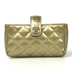 CHANEL Matelasse Golden Patent Leather Pouch